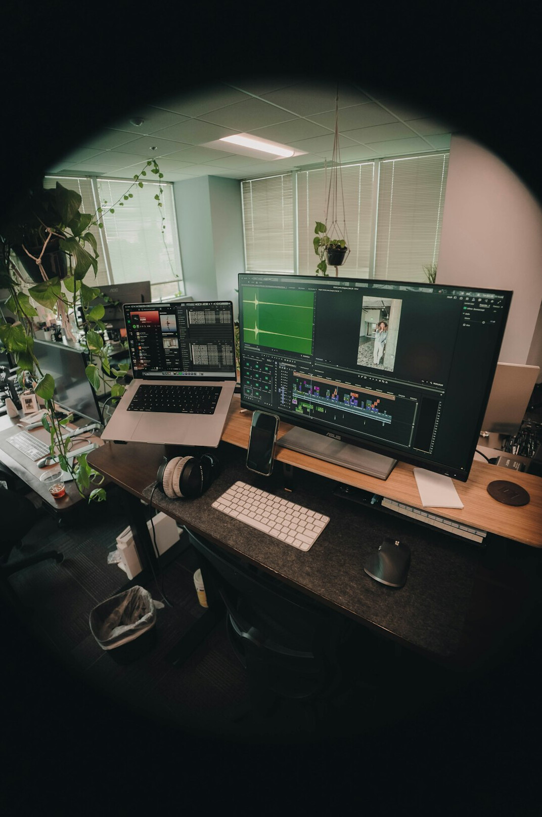 creative video editor at desk
